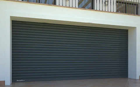 Industrial Roller Shutters vs. Overhead Sectional Doors: Architectural Footprint and Storm Wind Resistance